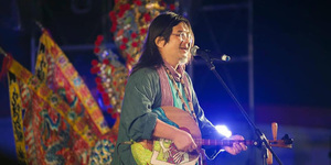 謝金河:伴著詠能的歌跑田中馬